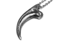Antiqued Velociraptor claw necklace in lead-free pewter, shown from the side